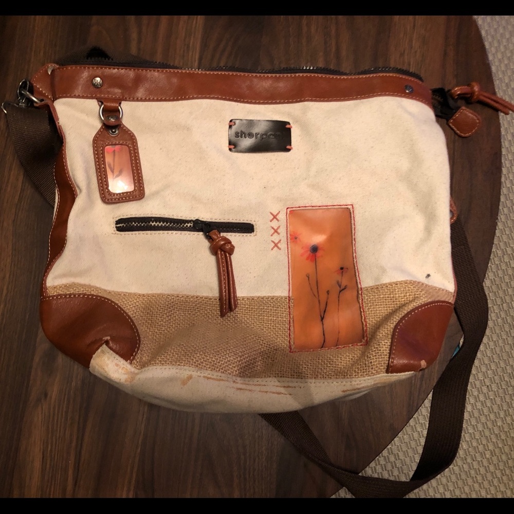 Sherpani crossbody purse with shoulder strap